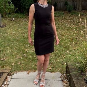 Little black dress fits like size 4